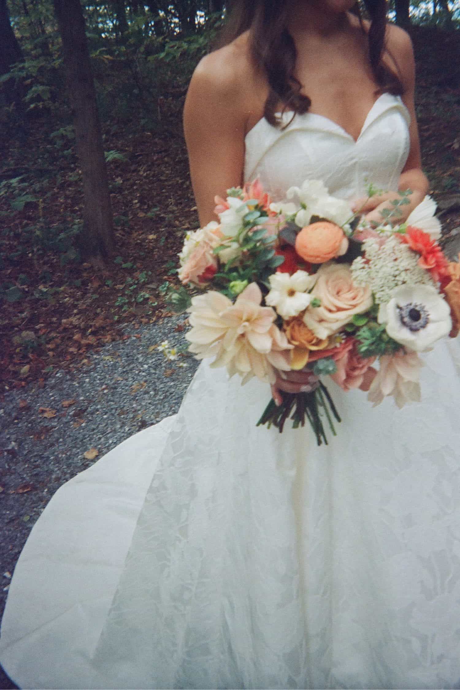 Vermont film wedding photography by The Light + Color. Apotheca Florals at Basin Harbor Wedding in Vergennes, VT 