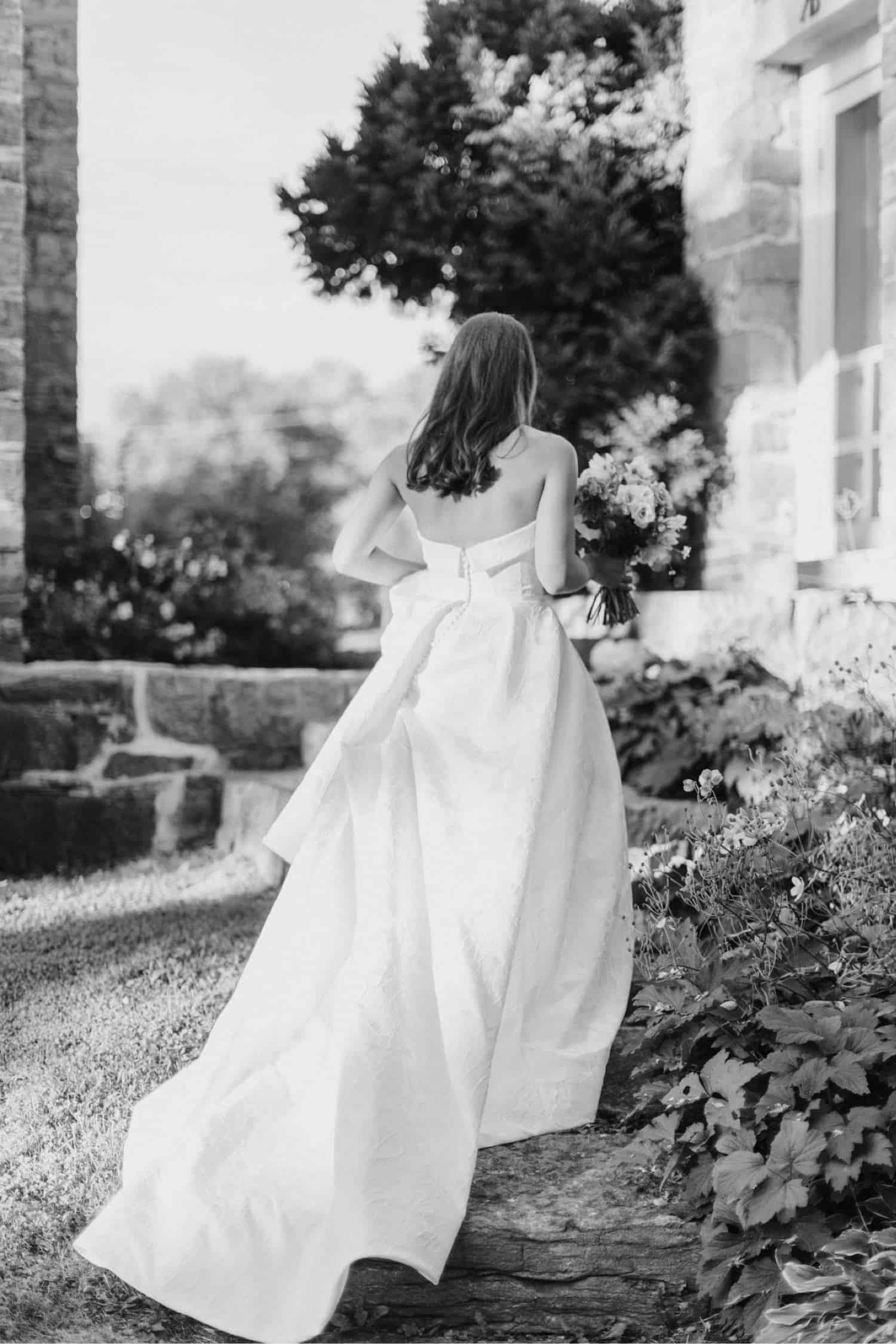 Bride in Allison Webb NYC at Basin Harbor wedding - Vermont wedding photographers