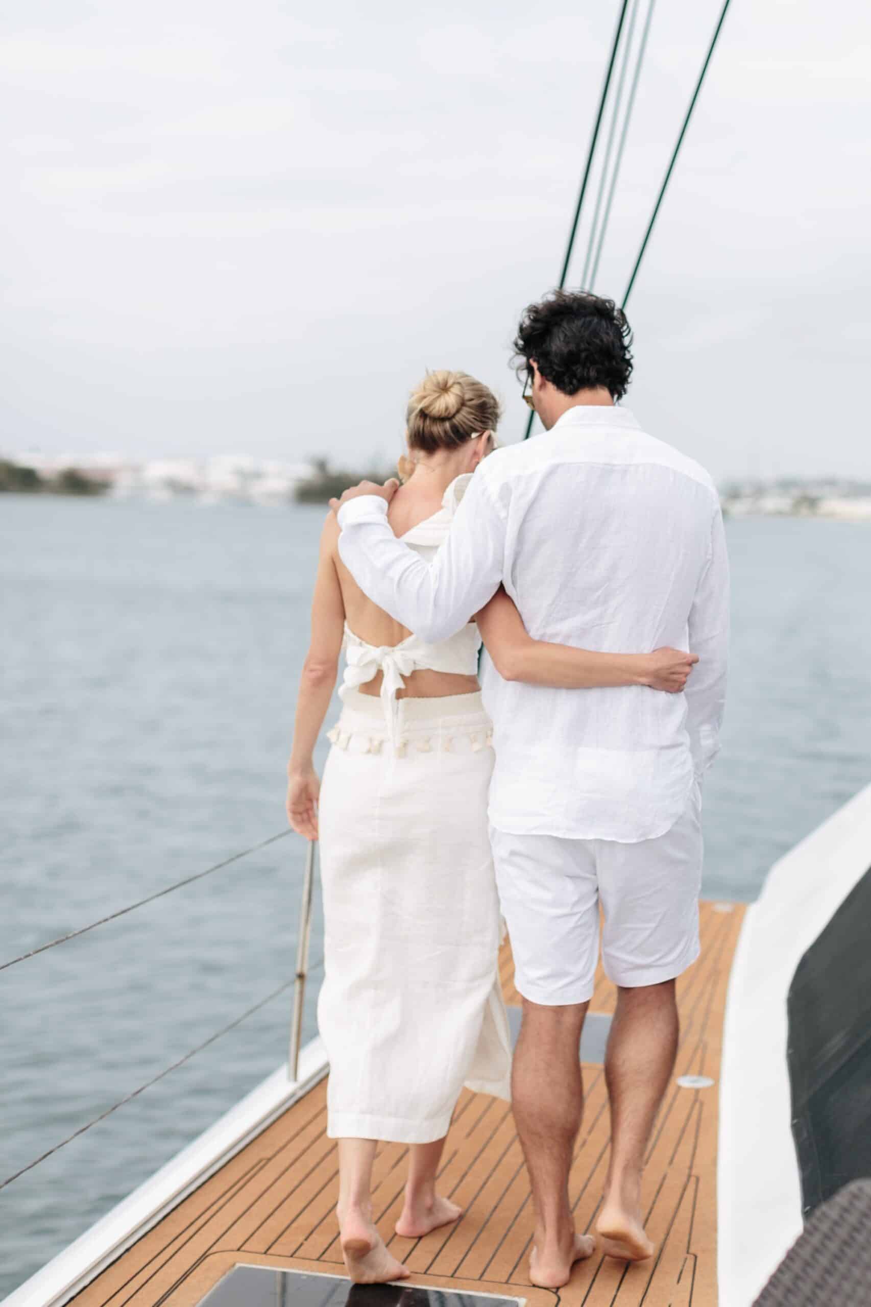Coral beach club wedding bermuda - Bride and Groom on catamaran around Bermuda