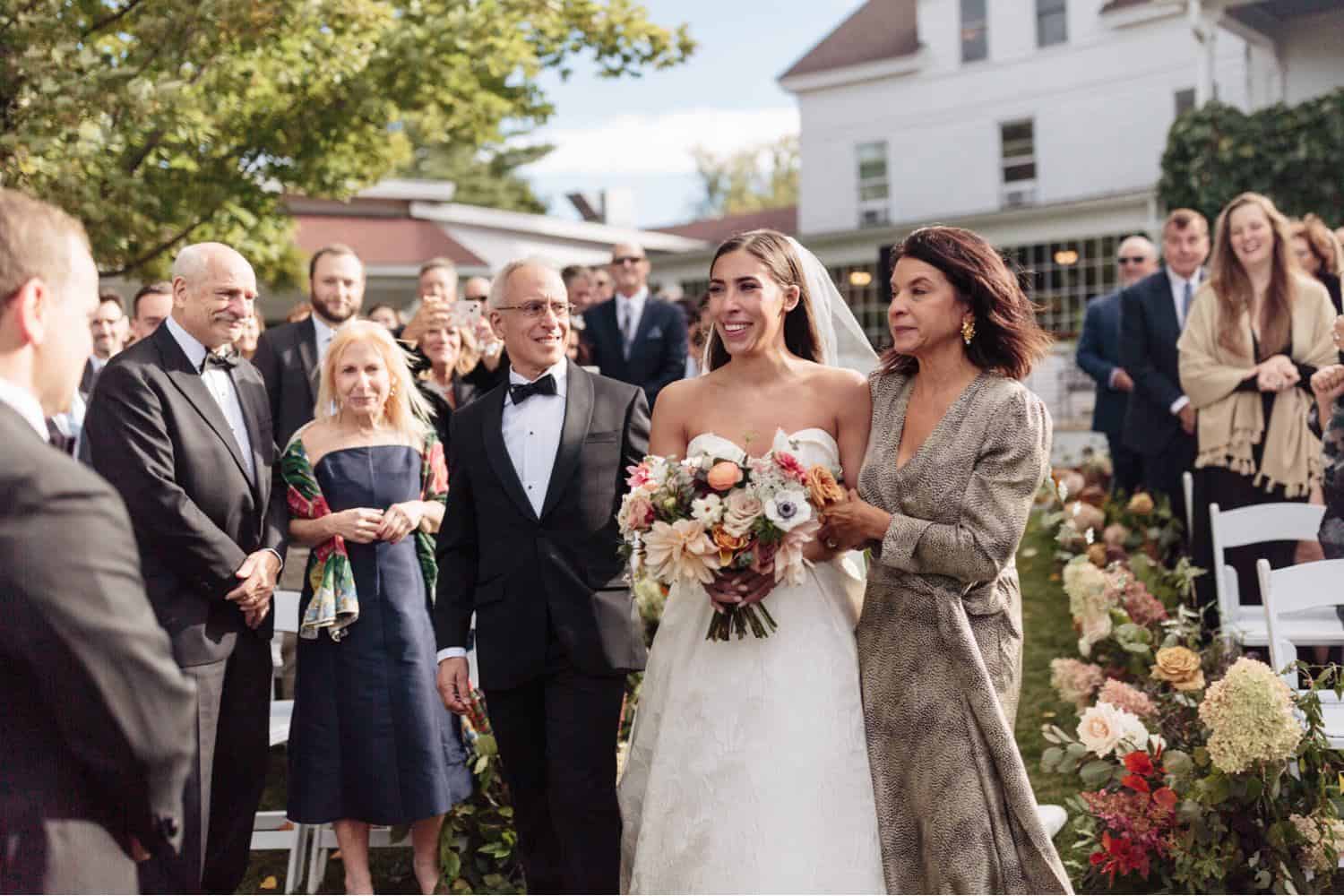 Vermont film wedding photography by The Light + Color. Apotheca Florals at Basin Harbor Wedding in Vergennes, VT 