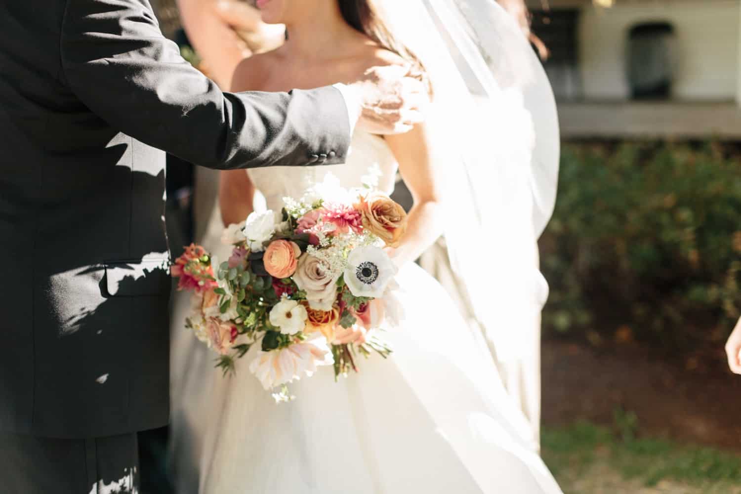 Bride in Allison Webb NYC at Basin Harbor wedding - Vermont wedding photographers