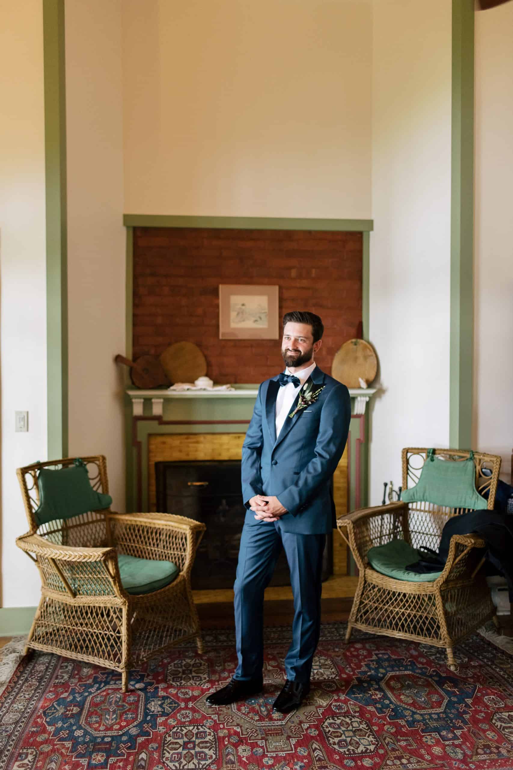 groom preparing for his Adirondack Wedding - Wedding Photographers Adirondacks - The Light + Color