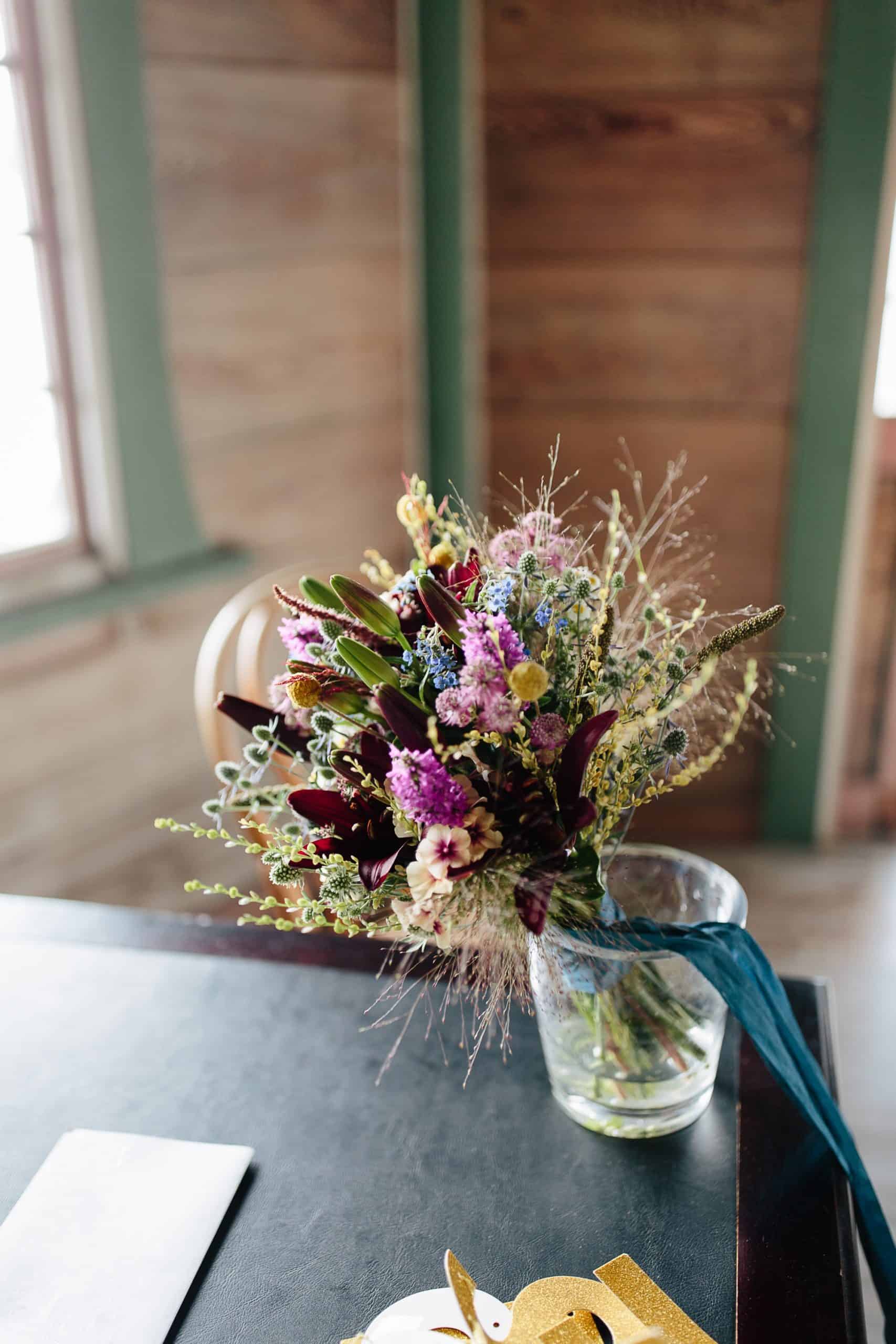 bouquet by little farm house flowers first at Adirondack Wedding in Paul Smith's NY- Wedding Photographers Adirondacks - The Light + Color