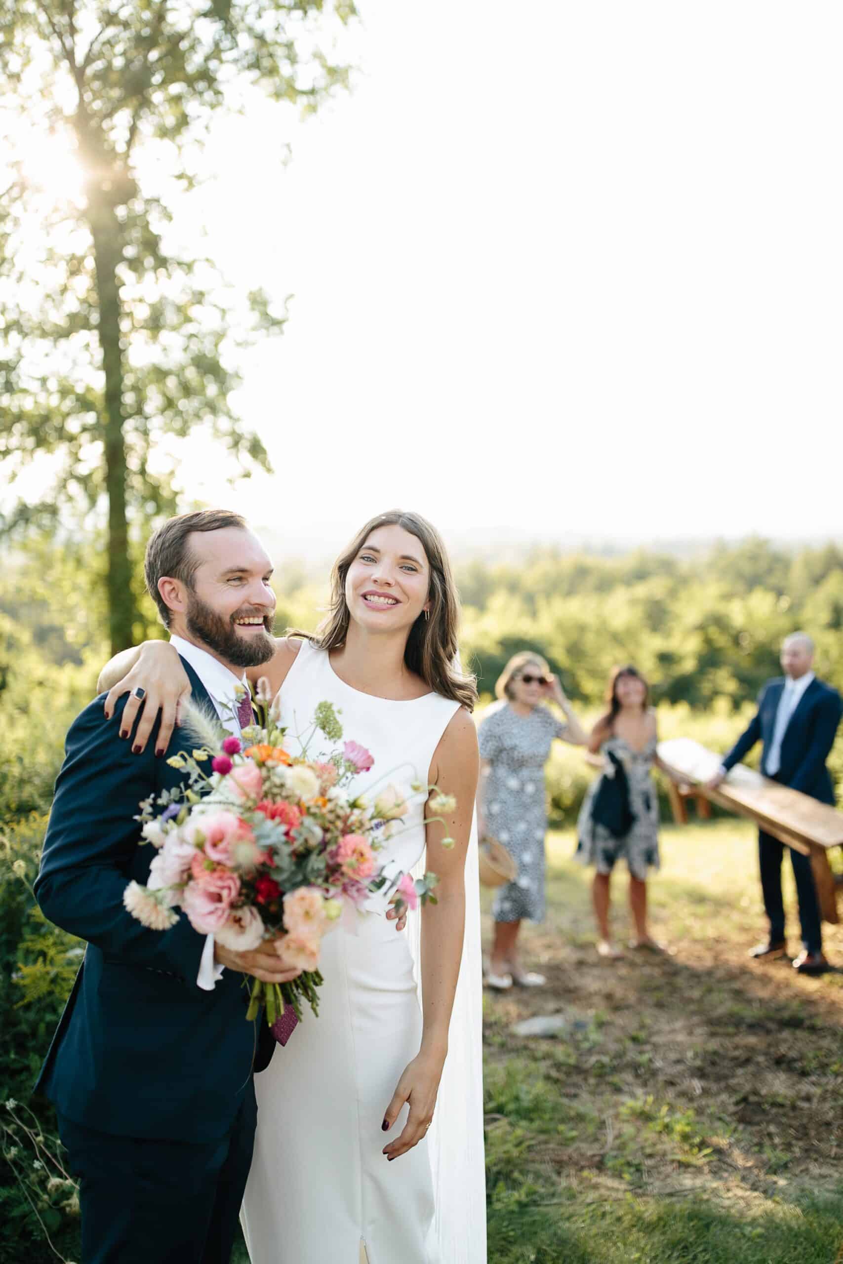 Upstate NY wedding photographers - bride and groom celebrate after wedding