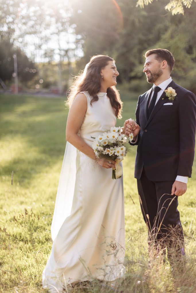 Couple in field at M and D Farm Wedding