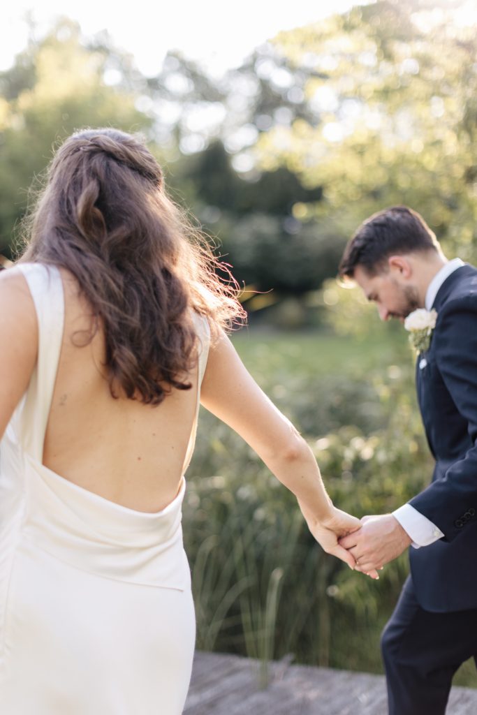 Couple at pond at M and D Farm Wedding