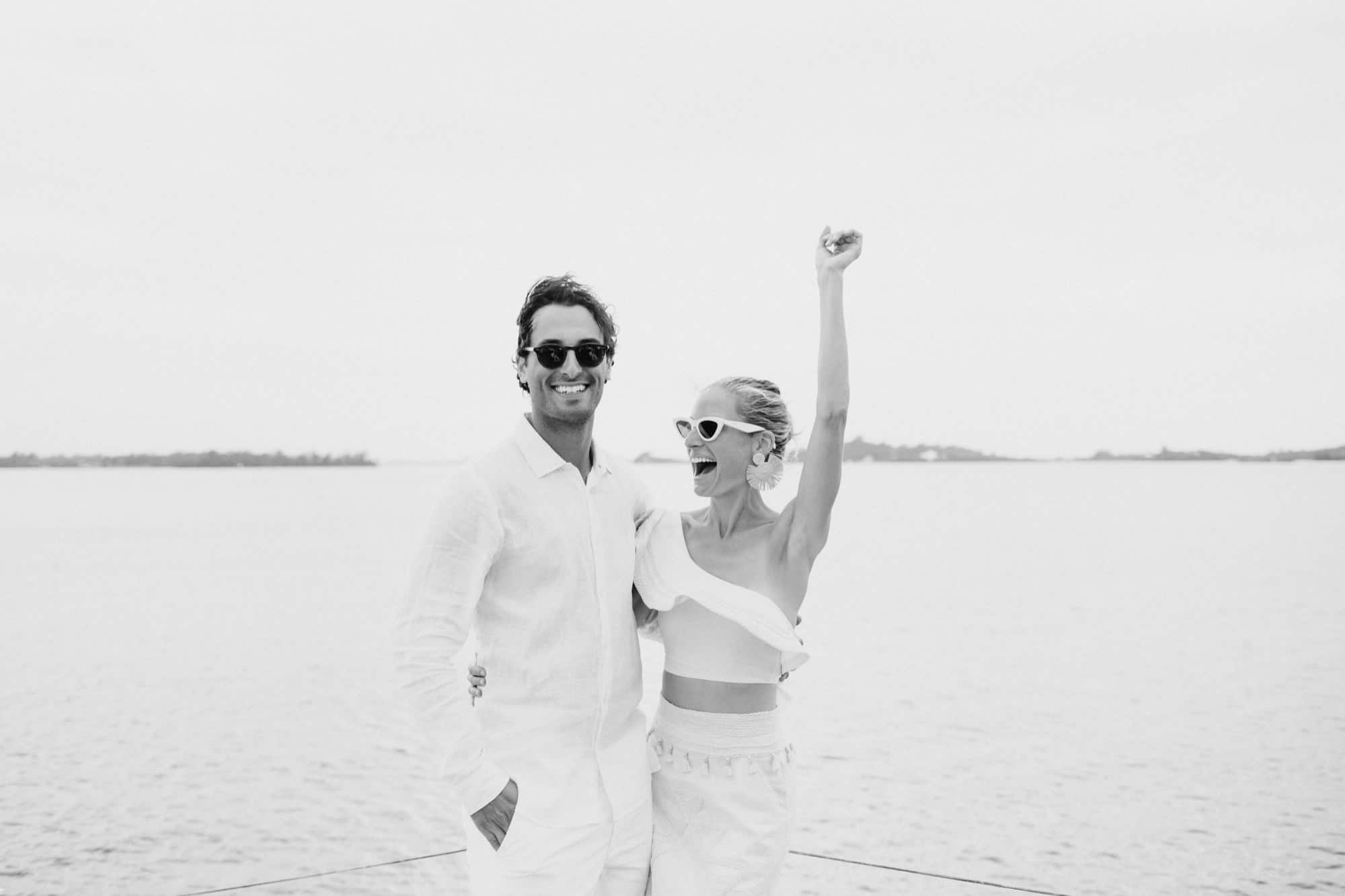 Coral beach club wedding bermuda - Bride and Groom on catamaran around Bermuda