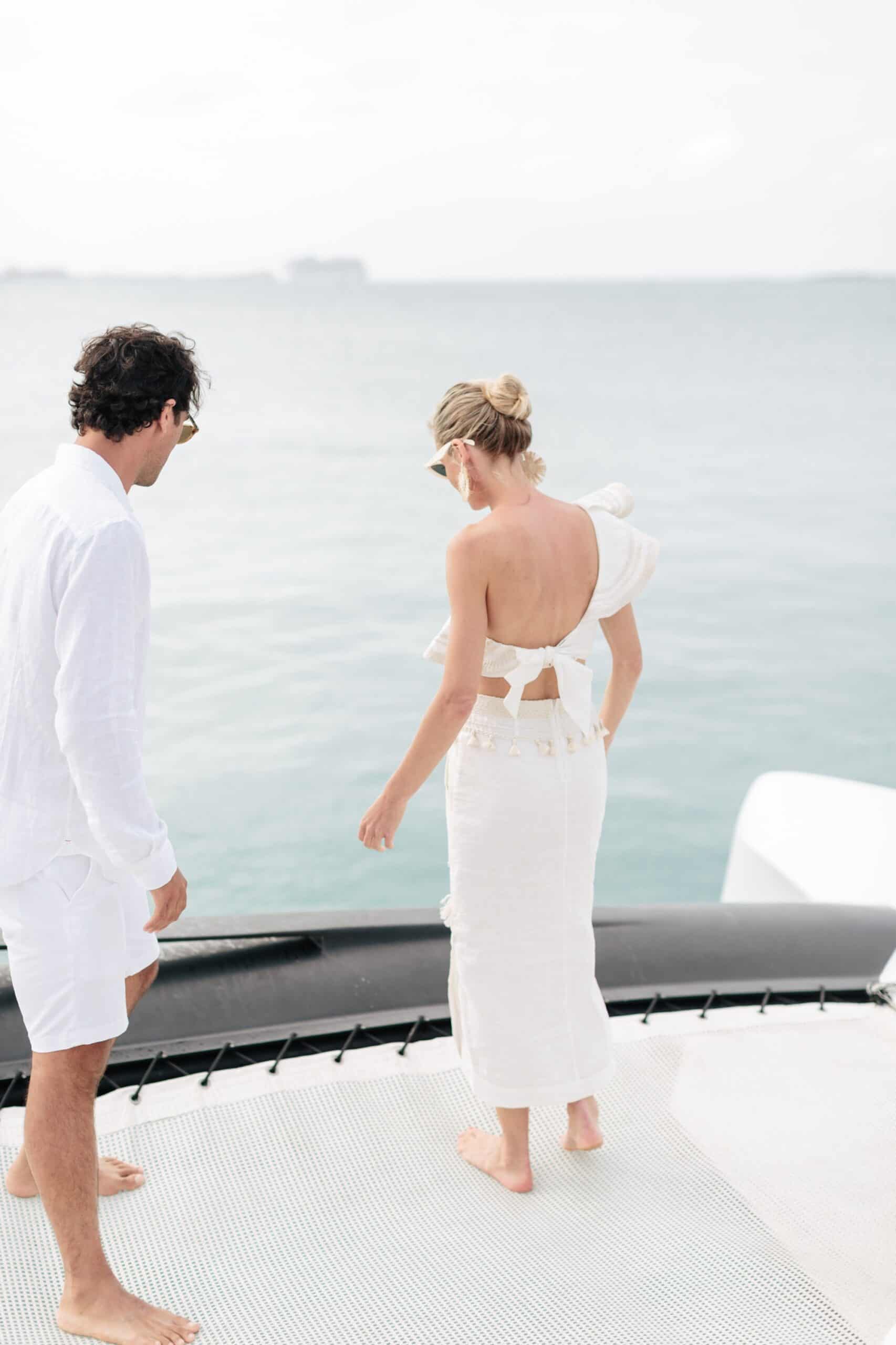 Coral beach club wedding bermuda - Bride and Groom on catamaran around Bermuda