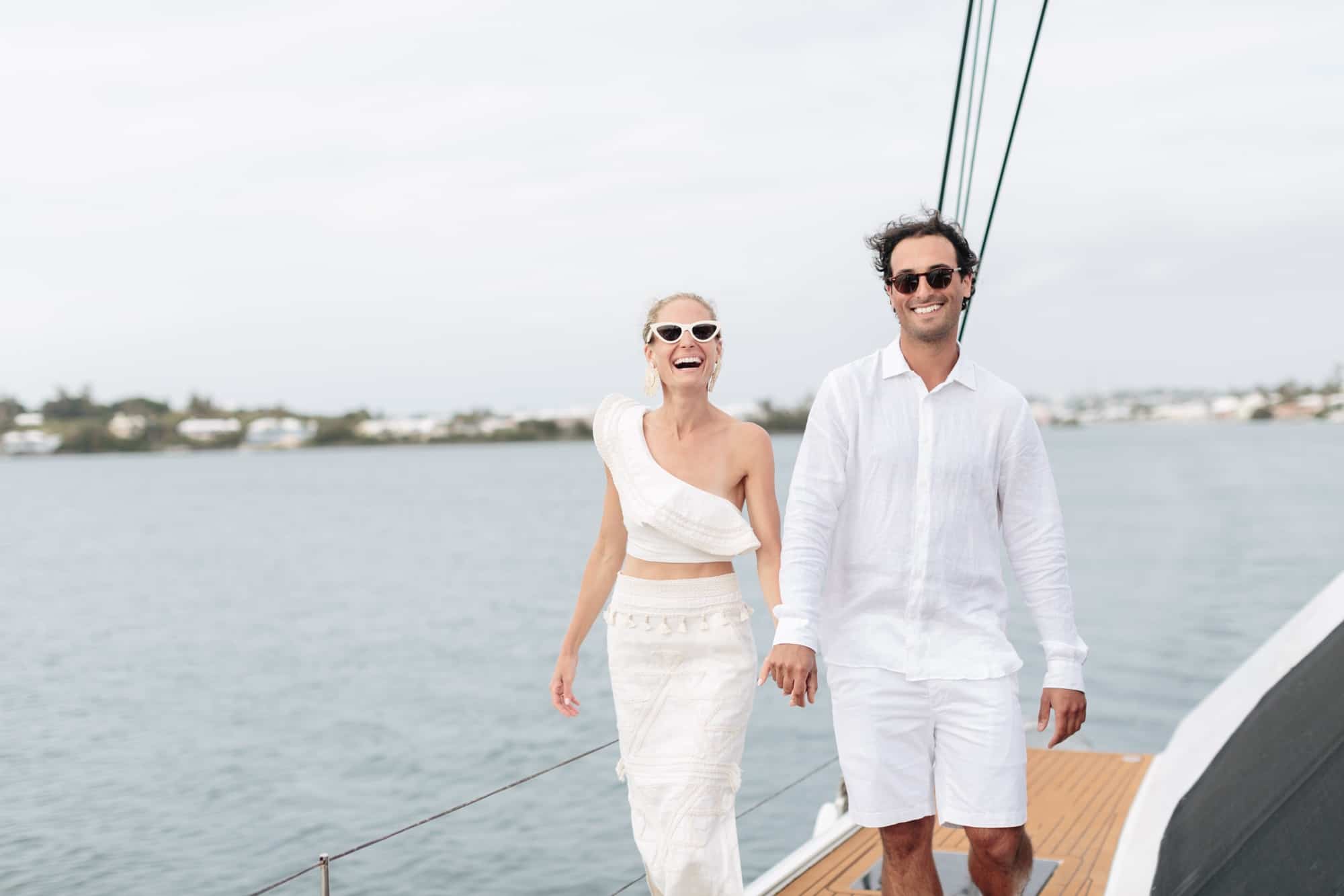 Coral beach club wedding bermuda - Bride and Groom on catamaran around Bermuda
