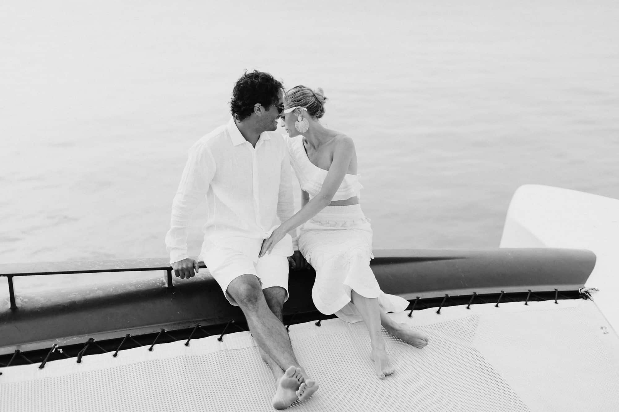 Coral beach club wedding bermuda - Bride and Groom on catamaran around Bermuda