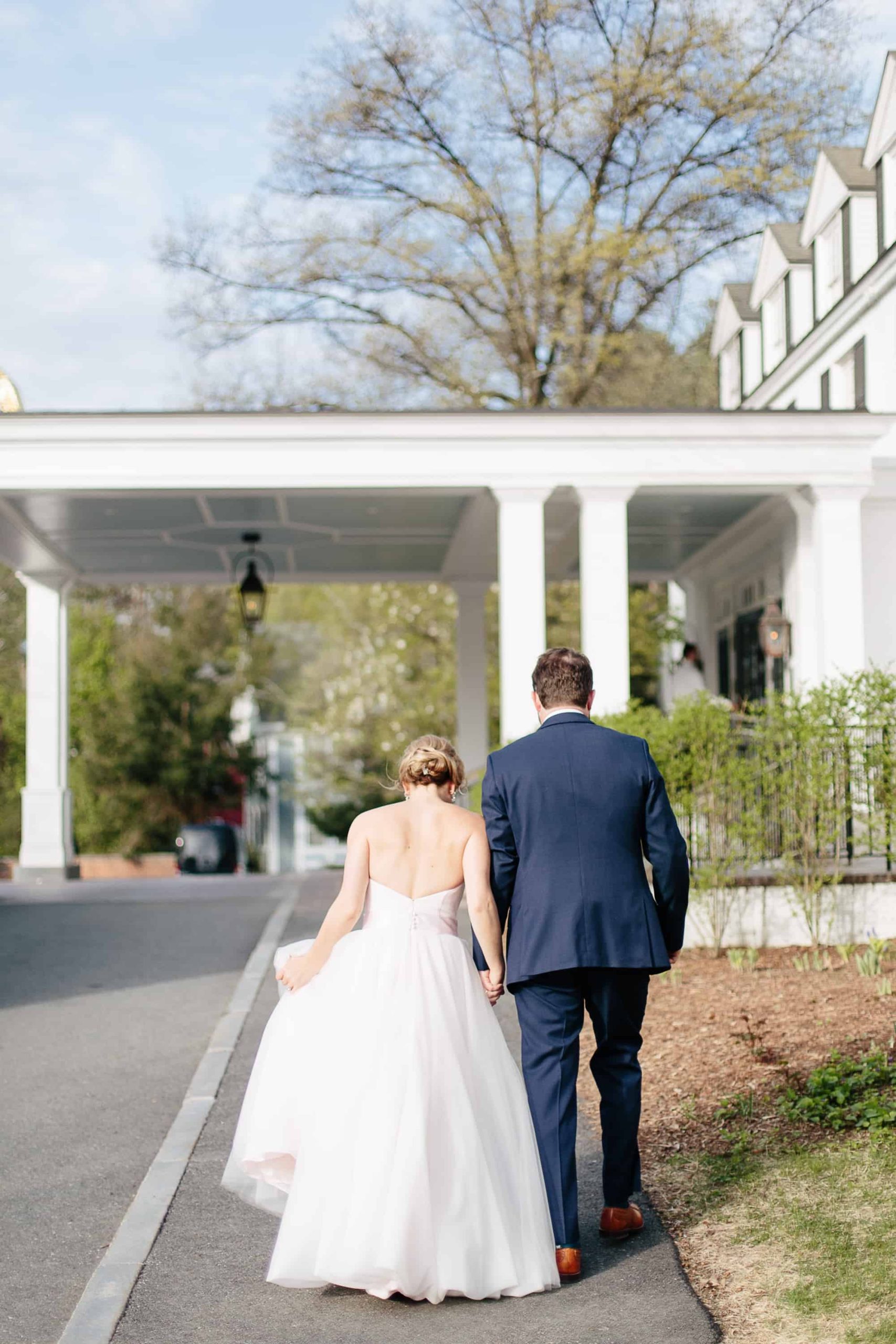 Couple walking into their Woodstock Inn wedding