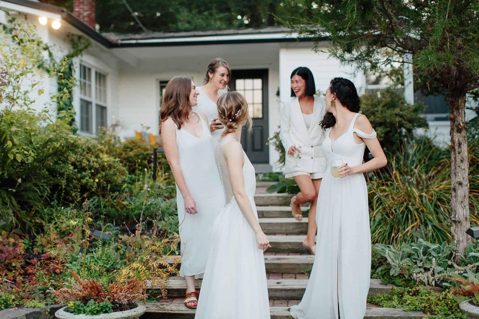 Bride and bridesmaids at their M&D farm wedding in the Catskills capture by upstate new york wedding photographers The Light and Color