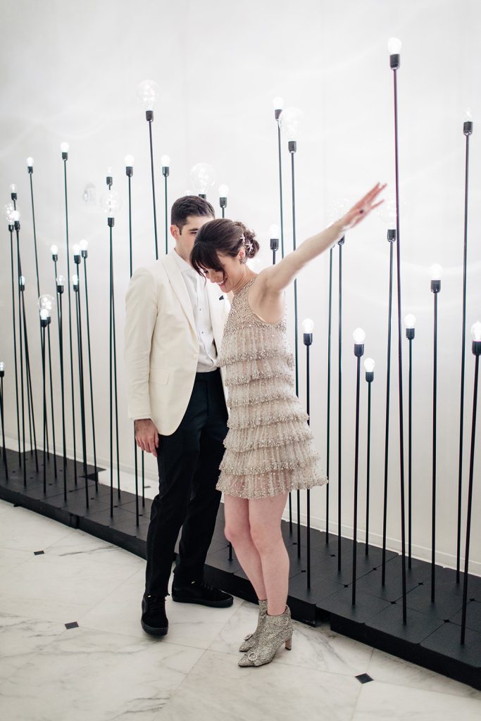 Bride dancing with groom in lobby of Miami Beach edition