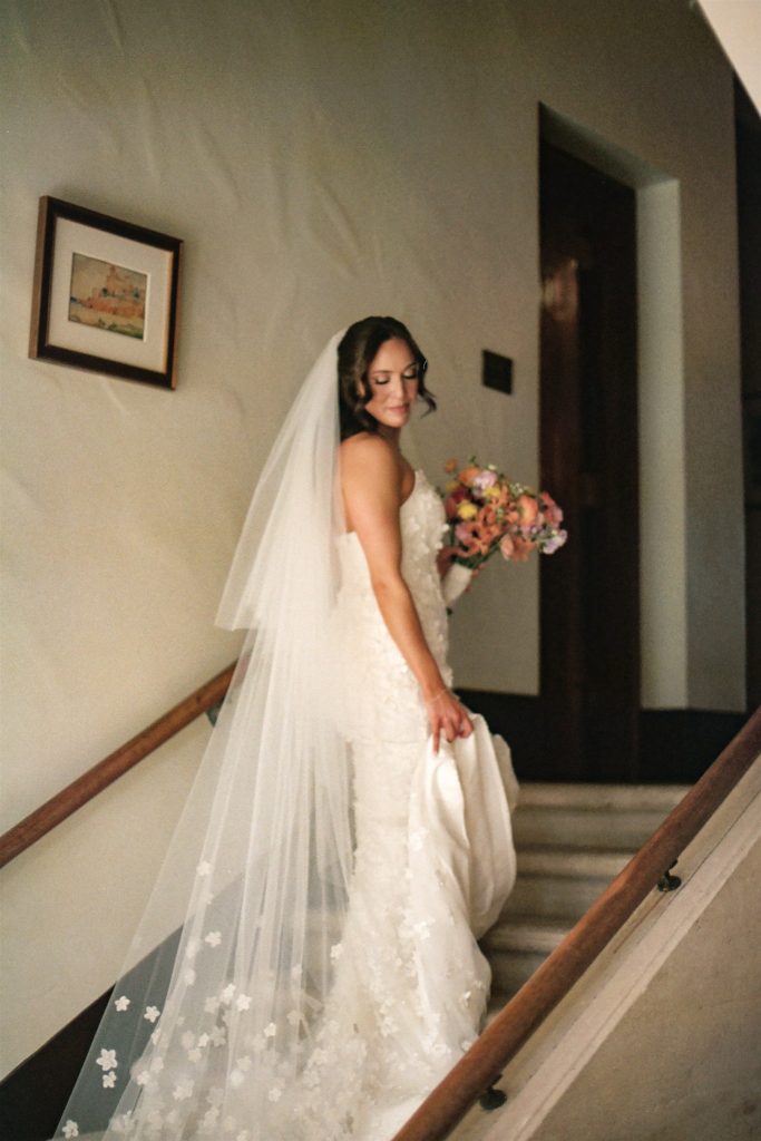 Bride on Stairs in house at Deering estate wedding
