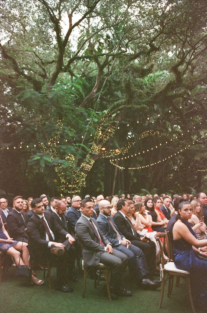Guests wait for ceremony to begin at Villa Woodbine wedding