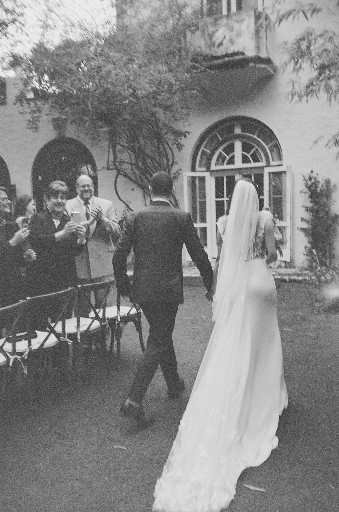 Bride and Groom recessing from their Villa Woodbine wedding