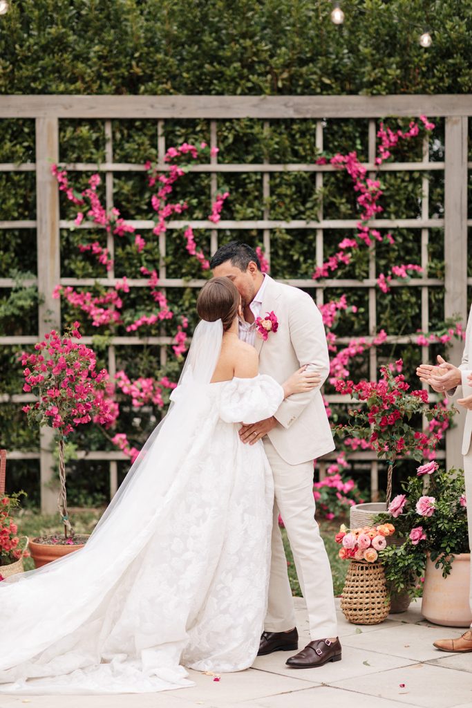 Bride and groom share first kiss at Whitetrail Club wedding
